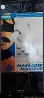 Photo of new Conair Touch and Tone Massager in original box showing six attachments