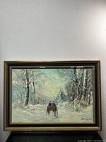 Full front view of framed winter landscape painting showing snow-covered trees and two horses.