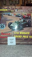 Front cover artwork of the 17th Monaco Grand Prix 1959 LP showing vintage race car with driver in racing scene.