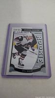 Photo of Max Domi Rookie hockey card with Arizona Coyotes, encased in a protective sleeve, showing full front of card