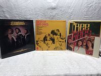 Lot of 3 Bee Gees vinyl albums including Children of the World, Best of Bee Gees, and Love Collection with front covers visible