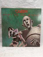 Front cover of Queen News Of The World record album showing famous robot artwork.