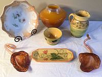 Photo showing entire set including ceramic pot, floral bowl, pitcher, ceramic olive tray, and glass lily decor pieces.