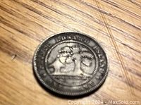 Reverse side of 1871 Prince Edward Island large penny coin showing Prince Edward Island crowned tree emblem and inscription.