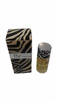 Photo of miniature Dolce & Gabbana By Man Eau de Toilette 4 ml bottle and matching zebra print box.