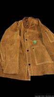 Brown suede men's jacket laid flat on black background, showing full front side with button closure and stitched details on pockets and sleeves.