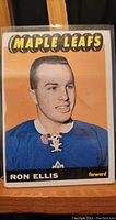 Front view of 1965-66 Ron Ellis rookie hockey card showing player image in Toronto Maple Leafs blue jersey.