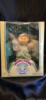 1985 Cabbage Patch Kids Preemie Louis Fletcher doll in original box, front view showing doll and box condition