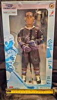 Front view of the unopened 1999 Starting Lineup Mark Messier 12-inch hockey figure in original box showing clear window and figure details.