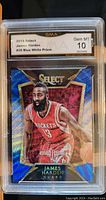 Front of 2014 Select James Harden #26 Blue White Prizm basketball card graded Gem Mint 10 by GMA showing full-color image and holographic blue and white prizm finish.