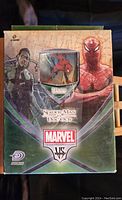 Front of Marvel Spider-Man vs. Doc Ock trading card game 2-player starter deck box with Spider-Man and Doc Ock artwork and a window showing a Spider-Man card inside.