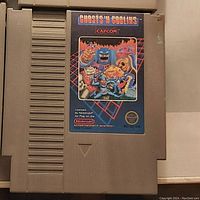 Photo of the Ghosts 'n Goblins game cartridge showing front label and physical condition.