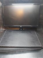 Front view of a black Acer computer monitor showing the screen and front bezel with Acer logo.