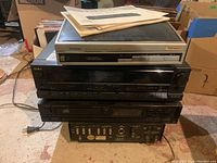 Stacked front view of all four components showing front panels