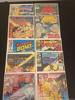 10 Marvel comic books arranged in two rows of four with two additional comics below.