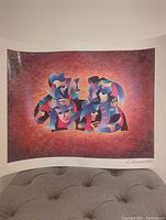 Overall view of the abstract print showing colorful armored/officer figures on a textured reddish background, signed in right bottom corner.