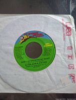 Close-up photo of the green label on the record showing MCA Records and song details