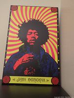 Front view of psychedelic Jimi Hendrix poster print with vivid colored design.