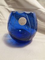 Cobalt blue crystal vase with Lenox label showing made in Poland and etched underwater plant design.