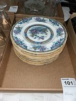 Stack of Royal Staffordshire Yeddo pattern plates showing front design with floral, pagoda and gold rim.