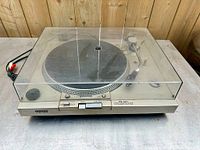 Full front view of Sony PS-T20 turntable with dust cover closed, showing overall condition and controls.
