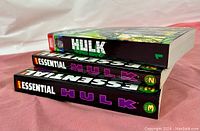 Side view photo of the three Essential Hulk volumes stacked with visible spines and volume numbers 1,2,3.