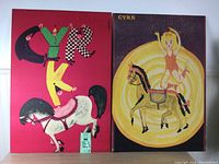 Pair of 1970s vintage Polish Cyrk posters, mounted on foam core, showing front view with both posters side by side. The left poster is a red background with large stylized "CYRK" letters and a white horse. The right poster has a yellow horse with a circus performer figure on a dark background with concentric yellow circles.