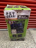 Original Pet Gear NV No-Zip Pet Stroller box with visible damage showing product image and branding.