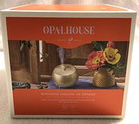 Front of the Opal House essential oil diffuser box showing the product image, brand and key features.