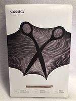 Front of package showing Sheertex logo, scissors graphic, and sheer tights inside.