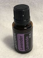 Front side of sealed 15ml doTerra Lavender Essential Oil bottle showing label and cap.