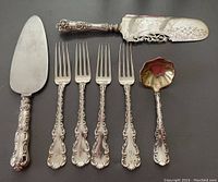 Full lot including forks, cake server, ladle, and boxed cake server