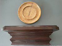 Photo of Leavitts PEI birds eye maple wooden plate, round approximately 6.5 inches diameter with natural wood grain.