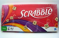 Front of the Scrabble game box showing branding and letter tiles spelling out 'FUN GAME'