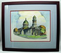 Frontal view of framed etching showing full artwork and matting inside a dark wood frame.