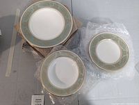 Assortment of dinner plate, side plate and soup bowl on bubble wrap