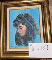 Framed portrait painting of young dark-haired woman on blue background, signed W. F. Seymour, measuring 8x10 inches.