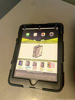 Front view showing packaging and front of case fit for 9.7 inch iPads.