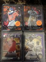 Front of four baseball cards featuring JD Davis, Justin Verlander, Bobby Dalbec, and Andrew McCutchen.