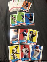 Photo showing a partial spread of baseball cards including Derek Jeter, Ken Griffey Jr., Alex Rodriguez, Barry Bonds, Sammy Sosa, Mark McGwire in colorful player action shots.