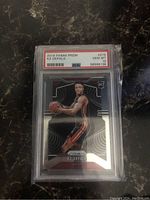 Front of the graded 2019 Panini Prizm KZ Okpala rookie basketball card showing player's image and PSA GEM MT 10 grade label