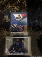 Front of Kylian Mbappe player card in PSG kit with Topps and UEFA logos