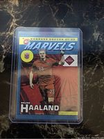 Front view of the Erling Haaland Marvels soccer card showing artwork, branding and player details