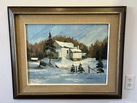 Front view of framed oil painting by Paul Thrane depicting a snowy landscape with house and pine trees.