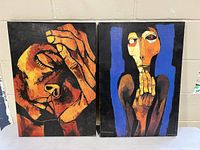 Pair of two macabre prints on board by Guayasamin with bold colors including orange, black, yellow and blue, showing the front view of the art pieces.