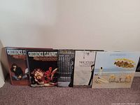 Photo of five vinyl albums lined up side by side. Two are Creedence Clearwater Revival albums, three are Neil Young albums.