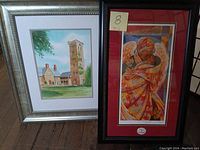 Two framed art prints side by side - a lithograph by Keith Mallett on the right with a red mat and a watercolor painting with a silver frame on the left.