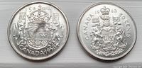 Obverse and reverse sides of 1958 and 1963 Canadian 50 cent silver coins showing detailed engravings and wear.
