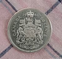 Reverse side showing the Canadian coat of arms with denomination and year 1961.