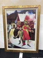 Front view of the framed Marc Chagall art print showing the violinist and accompanying figures on a curved path.